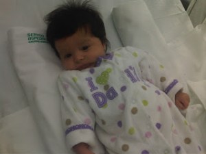 Naomi in her hospital bed. Not happy.